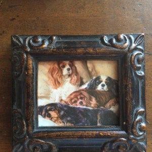 Miniature painting on a canvas print of CAVALIER KING CHARLES spaniels.