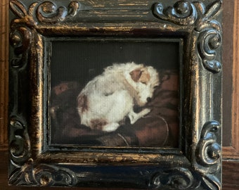 HAND PAINTED MINIATURE on a 2.5x3” linen paper print , bonded to canvas, of sleepy white terrier dog, placed in an antiqued resin frame