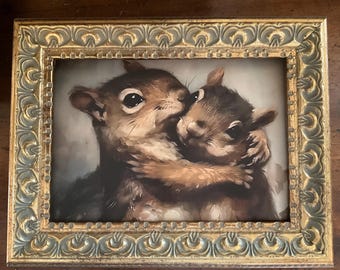 5x7” canvas geclee of hugging squirrels, placed in you choice of gold frames