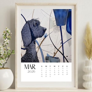 Puede incluir: Impresión artística enmarcada con un retrato de perro azul estilizado y texturizado, con elementos abstractos azules y marrones. El calendario muestra marzo de 2026. La impresión se presenta en un marco de madera clara.