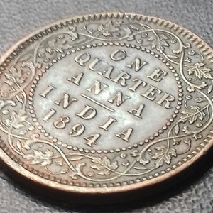 Coin 1894 quarter Anna coin. India. Mint