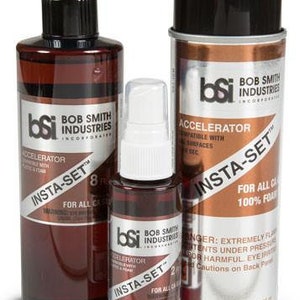 May include: Three bottles of Bob Smith Industries Insta-Set accelerator for foam. The bottles are labeled with the company logo and product name. The largest bottle is 4.4 oz and the smallest is 2 oz.