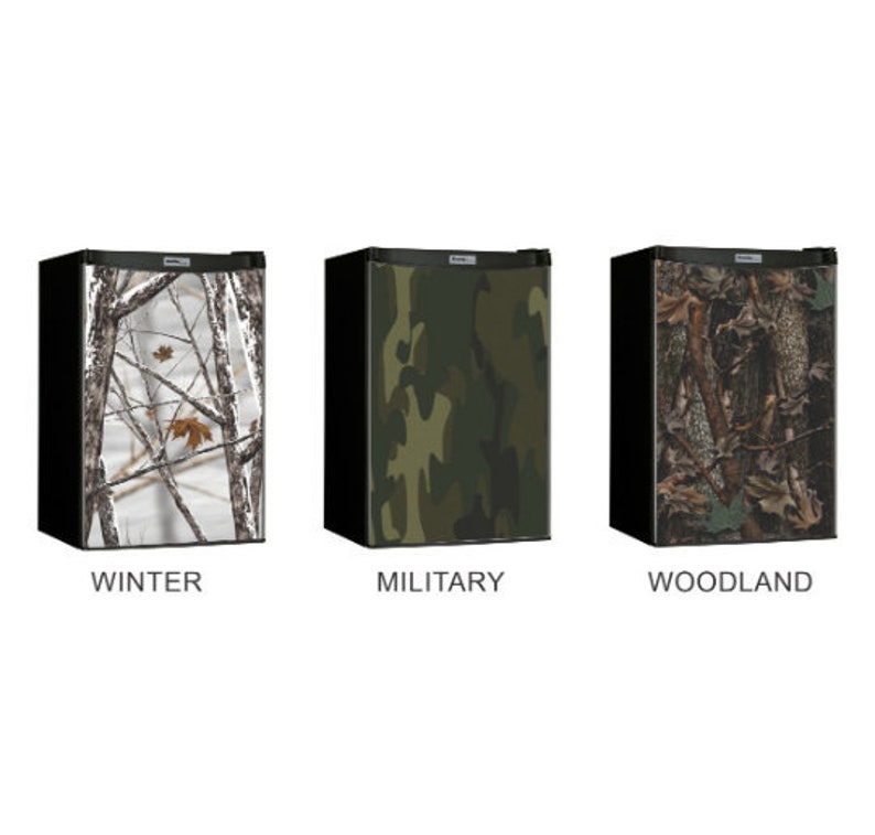 May include: Three mini refrigerators with different camouflage patterns. The first refrigerator has a white and brown winter camouflage pattern. The second refrigerator has a green and brown military camouflage pattern. The third refrigerator has a brown and green woodland camouflage pattern.
