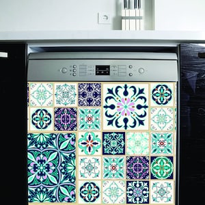 May include: A stainless steel dishwasher with a decorative tile design in shades of blue, green, and white. The tiles feature intricate patterns and floral motifs.