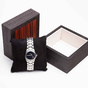 Een houten kist als horloge