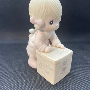 Vintage Precious Moments “Sharing Is Universal “ Figurine. Enesco E-0007.