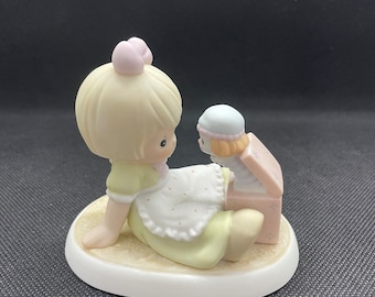 Vintage Precious Moments “Life’s Filled with Little Surprises” figurine. 524034