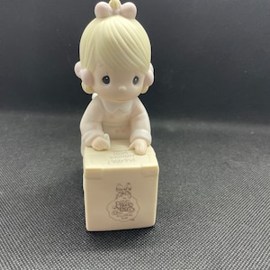 Vintage Precious Moments “Sharing Is Universal “ Figurine. Enesco E-0007.