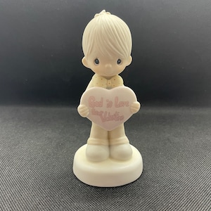 Vintage Precious Moments “God is Love, Dear Valentine” Figurine. Enesco E-7153.