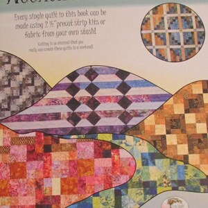 May include: A book cover titled "Weekend Wonders" featuring colorful quilt patterns. The cover includes text stating that the quilts can be made using 2 1/2" precut strip kits or fabric. The design incorporates various quilt block designs in shades of red, blue, and brown.