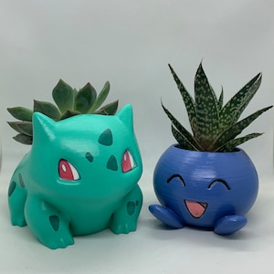 Painted Bulbasaur and Oddish Planters with Live Succulents/Cacti (Two Planters in each order!!)