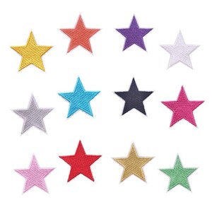 May include: A collection of twelve embroidered star-shaped patches in various colours including yellow, orange, purple, white, silver, light blue, dark blue, magenta, light pink, red, gold, and green, each featuring a distinct stitched texture.