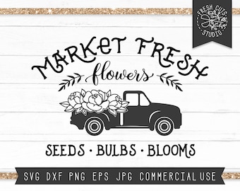 May include: Black and white silhouette of a pickup truck with a bed full of flowers. The text "MARKET FRESH flowers" is above the truck and the text "SEEDS. BULBS. BLOOMS" is below the truck. The text "FRESH CUTS STUDIO" is in a circle in the upper right corner of the image.