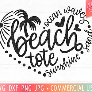 May include: Black and white graphic design of a heart shape with the text "ocean waves beach tote sunshine sand" inside. The text is in a handwritten style.