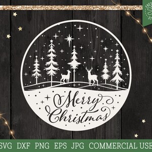 May include: White silhouette of a winter scene with a forest of pine trees, two deer, and a star in a circle. The text "Merry Christmas" is written in a cursive font.