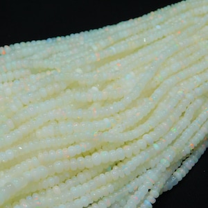 AAA+ Ethiopian Opal Rondelle Beads: Welo Opal, 3.5-5mm, 16 Inch Strand