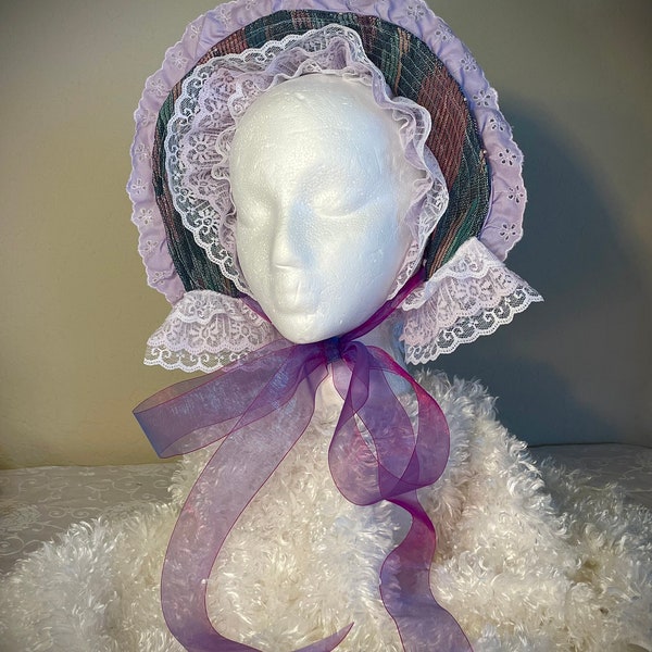 Upcycled blue and purple Spoon Bonnet from vintage upholstery samples and thrifted notions.