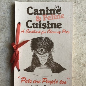 1996 Canine & Feline Cuisine &quot;Pets are People too&quot; A cookbook for chewsy pets, dogs, cats, birds Signed by author Patsy Swendson SW guidedog