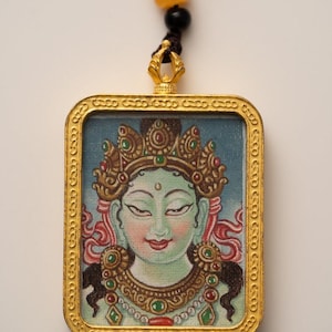 Sacred Green Tara Thangka with Locket – Handcrafted Tibetan Amulet for Compassion, Protection & Spiritual Healing