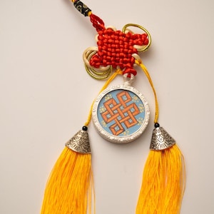 Tassel-Adorned Endless Knot Locket - Symbol of Eternal Unity, Wisdom & Protection