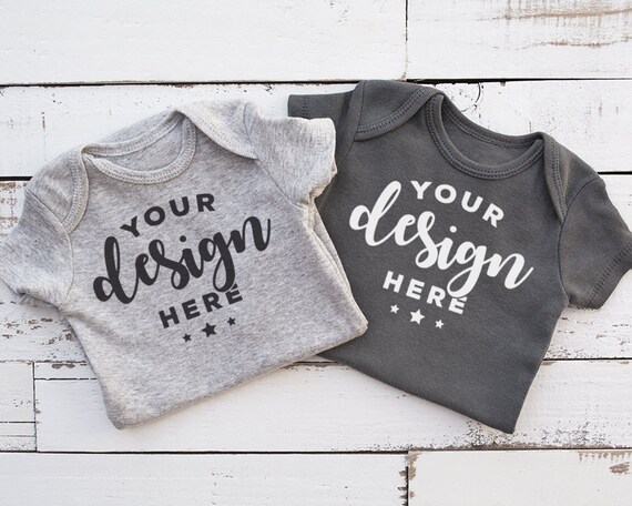 Gray Bodysuits Mockup Closeup On Distressed Wood Background Infant