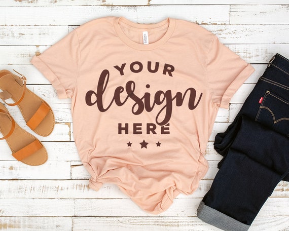 Bella Canvas 3001 T-Shirt Mockup Peach On Distressed Wood Bella Canvas 3001 T-Shirt Mockup Peach On Distressed Wood