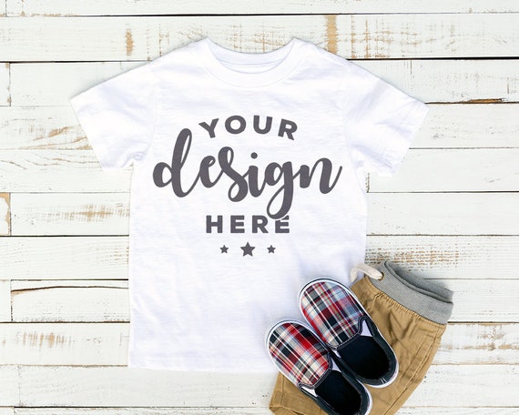 White Kids T-Shirt Mockup On Distressed Wood White Background