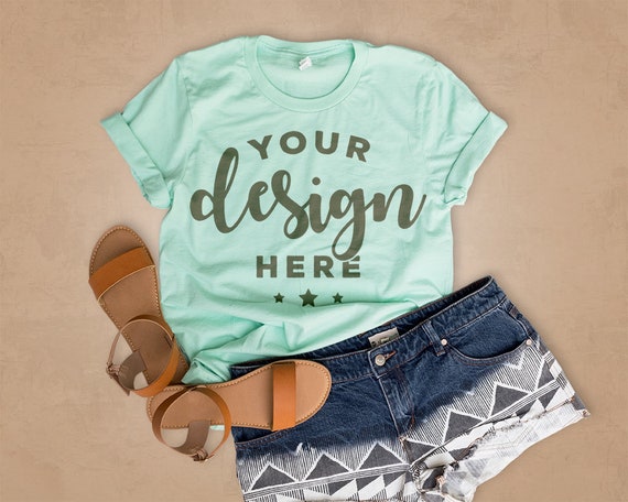 Mint T-Shirt Mockup On Brown Background With Distressed Jean