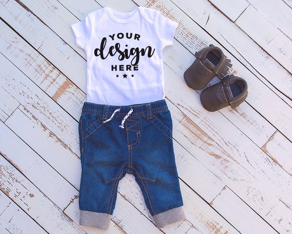 White Bodysuit Mockup With Infant Jeans And Moccasins On White Bodysuit Mockup With Infant Jeans And Moccasins On