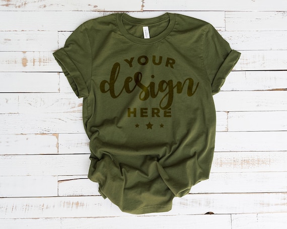 Bella Canvas 3001 T-Shirt Mockup Olive Green On Distressed Bella Canvas 3001 T-Shirt Mockup Olive Green On Distressed