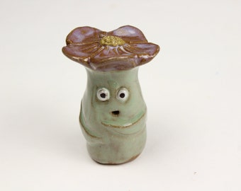 Flower critter figurine