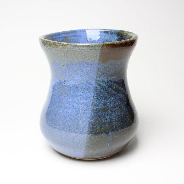 Blue and brown vase with drip pattern.