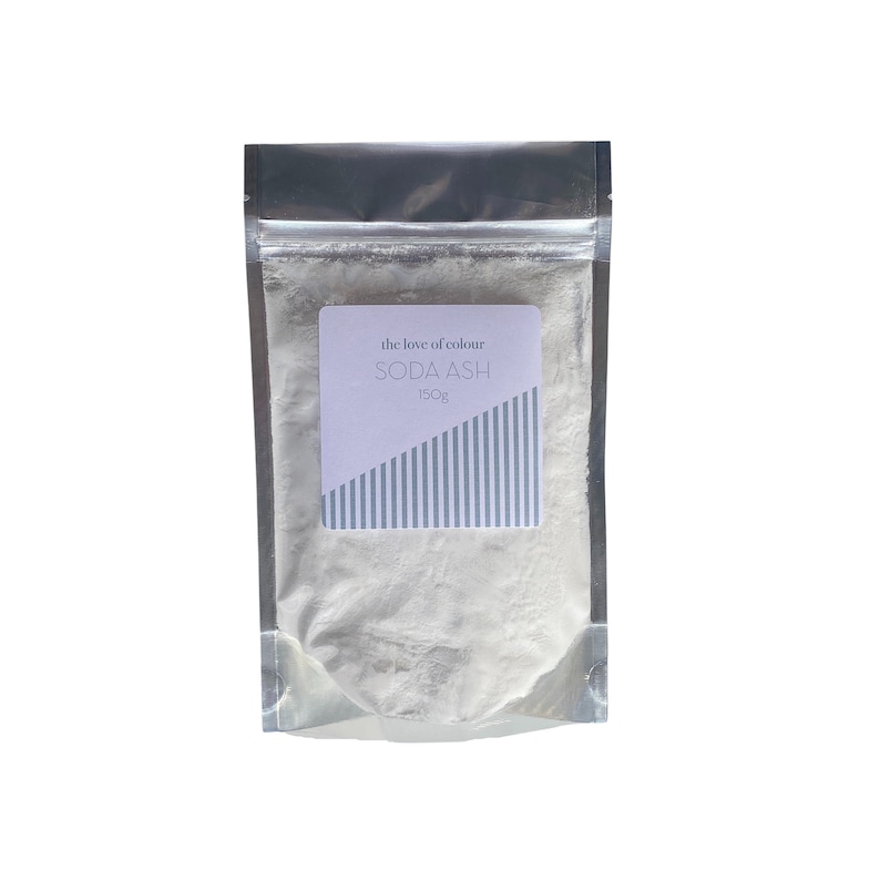 May include: A silver resealable pouch containing a white powder labeled "the love of colour SODA ASH 150g".