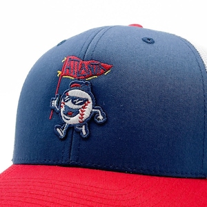 May include: A blue and red baseball cap with a white mesh back. The cap features an embroidered logo of a baseball character holding a flag that says "Atlanta".