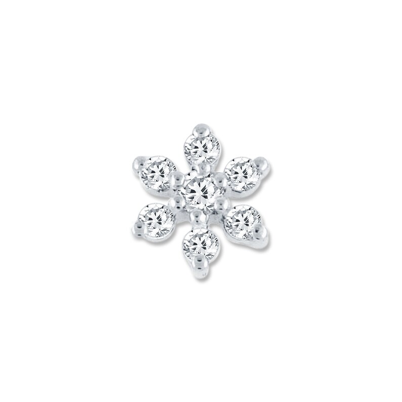 May include: A silver snowflake earring with clear cubic zirconia stones.