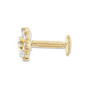 May include: A gold nose stud with a flower design featuring small clear stones.