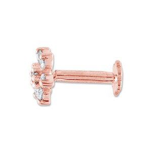 May include: A rose gold nose stud with a flower design featuring small clear diamonds.