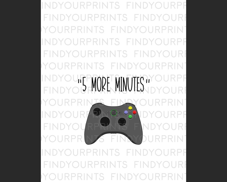 May include: A black and green video game controller with the text "5 More Minutes" printed on a white background.
