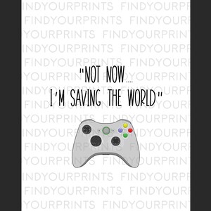 May include: A white and gray video game controller with green buttons. The text "Not now... I'm saving the world" is written in black on a white background.