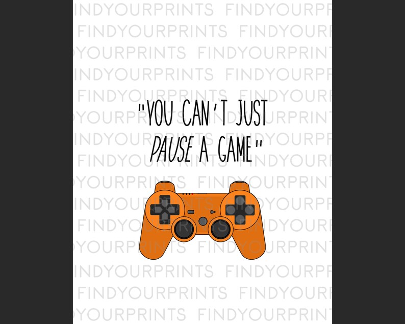 May include: Orange and black video game controller with the text "You can't just pause a game" on a white background.