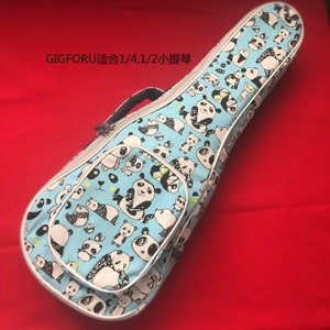 Puede incluir: Una funda de ukelele azul con ribete blanco y estampado de panda. La funda tiene una correa y un bolsillo. GIGFORU 适合 1/4,1/2 小提琴.