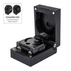 May include: Black 0.22 calibre magazine and case. The magazine is in an open black case with the text "Compatible with: Daystate Delta Wolf (2020)". The magazine is black with the number 0.22 printed on it.