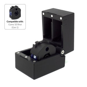 May include: Black 3D-printed accessory for a Gamo 10 Shot (Gen 1) air rifle. The accessory is a box with a hinged lid, and a rotating cylinder with the number 8 visible. The text "Compatible with: Gamo 10 Shot (Gen 1)" is in a white box.