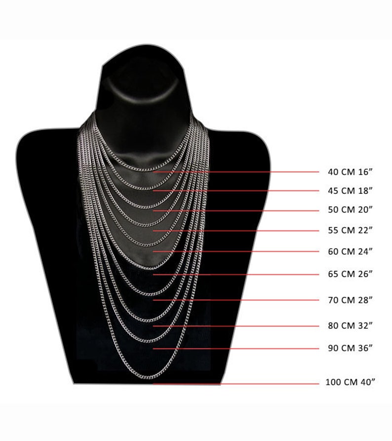 Peut inclure: Un tableau montrant diff&eacute;rentes longueurs de cha&icirc;ne en pouces et en centim&egrave;tres. Les longueurs de cha&icirc;ne vont de 16 pouces &agrave; 40 pouces. Le tableau est affich&eacute; sur un mannequin noir.