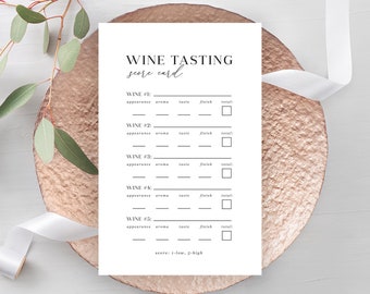 May include: A printable wine tasting score card with five sections for rating different wines. Each section has spaces to rate the appearance, aroma, taste, and finish of the wine. The score card also includes a space to rate the overall score of the wine.
