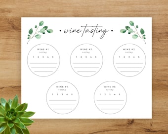 May include: Printable wine tasting sheet with five circles for rating different wines. Each circle has a number scale from 1 to 5 and space to write notes. The sheet is decorated with eucalyptus leaves.