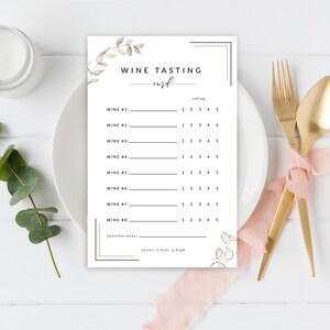 May include: A printable wine tasting card with a floral design. The card has a section for rating each wine on a scale of 1 to 5. It also includes a space to write down the favorite wine and its score.