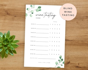 May include: A white wine tasting card with the words "wine tasting" and "blind wine tasting" printed on it. The card has spaces to rate eight wines and a space for a favorite wine. The card is decorated with green watercolor eucalyptus leaves.
