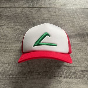 May include: A red and white baseball cap with a green embroidered letter 'A' on the front.