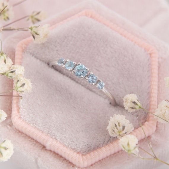 Sterling Silver London and Swiss Blue Topaz Star Curved Ring Sterling Silver London and Swiss Blue Topaz Star Curved Ring